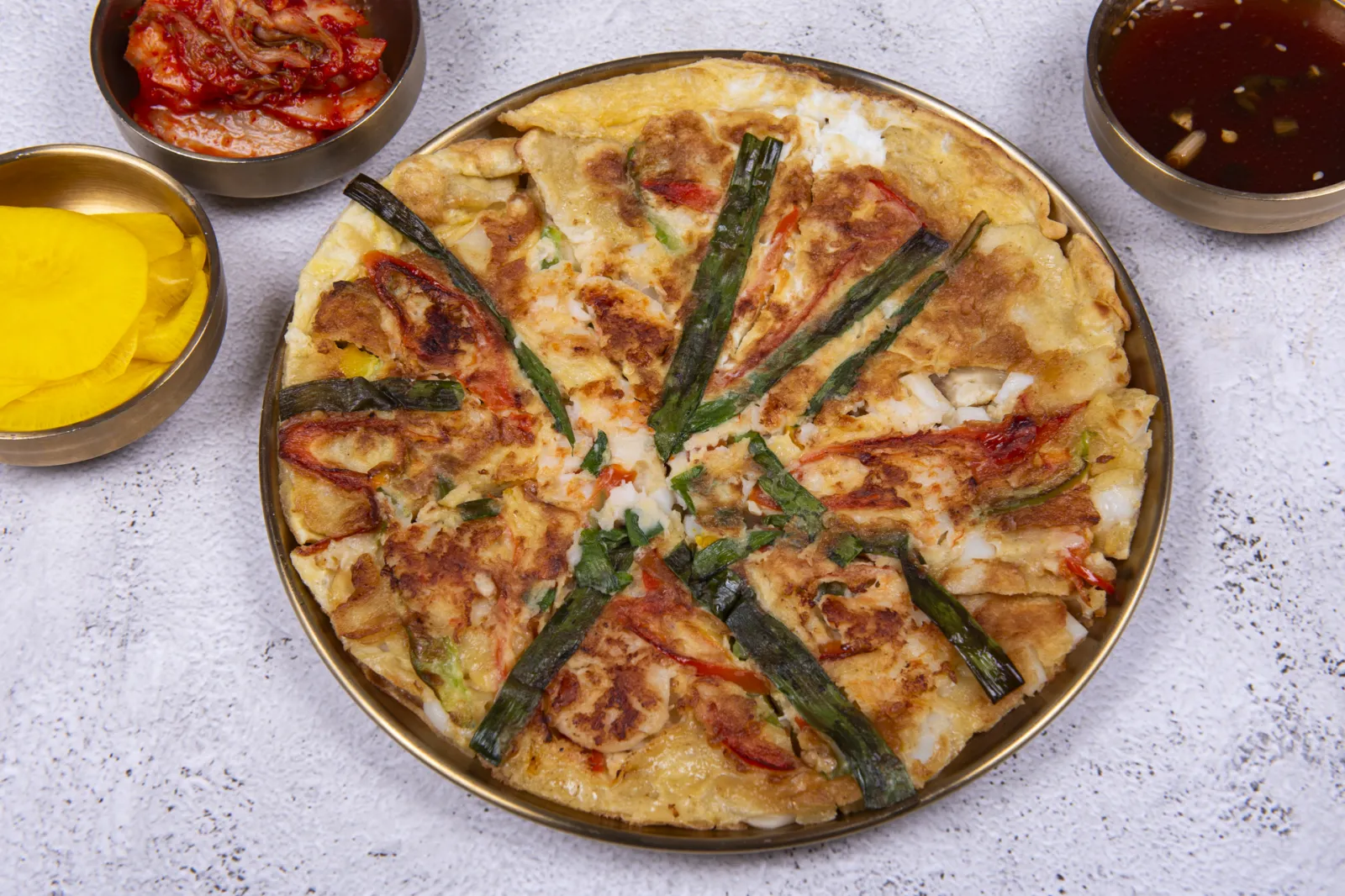 Sizzling Korean haemul pajeon seafood pancake, fresh off the pan