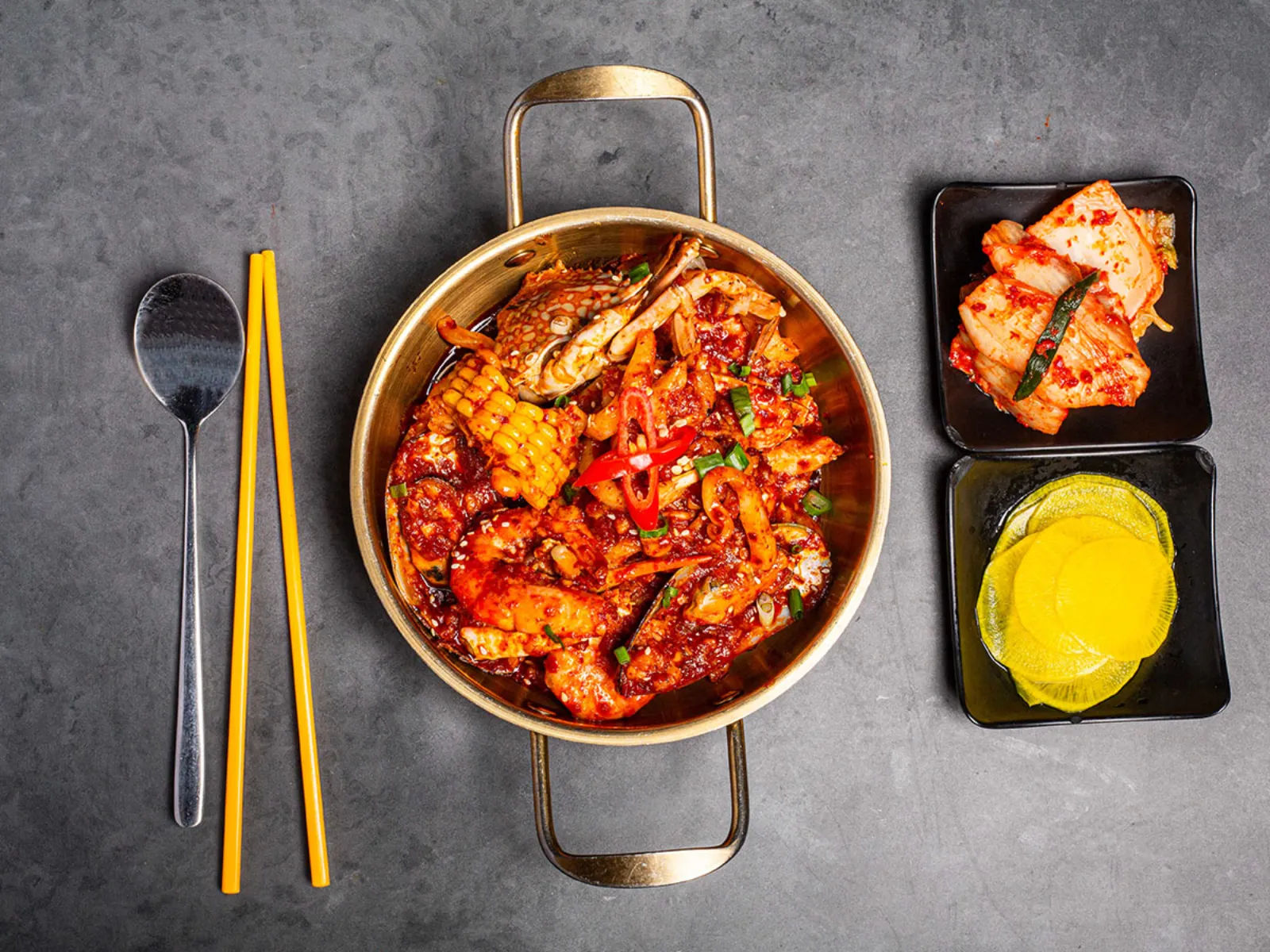Unlimited all-you-can-eat Korean seafood boil in spicy red sauce at Mukbang Shows