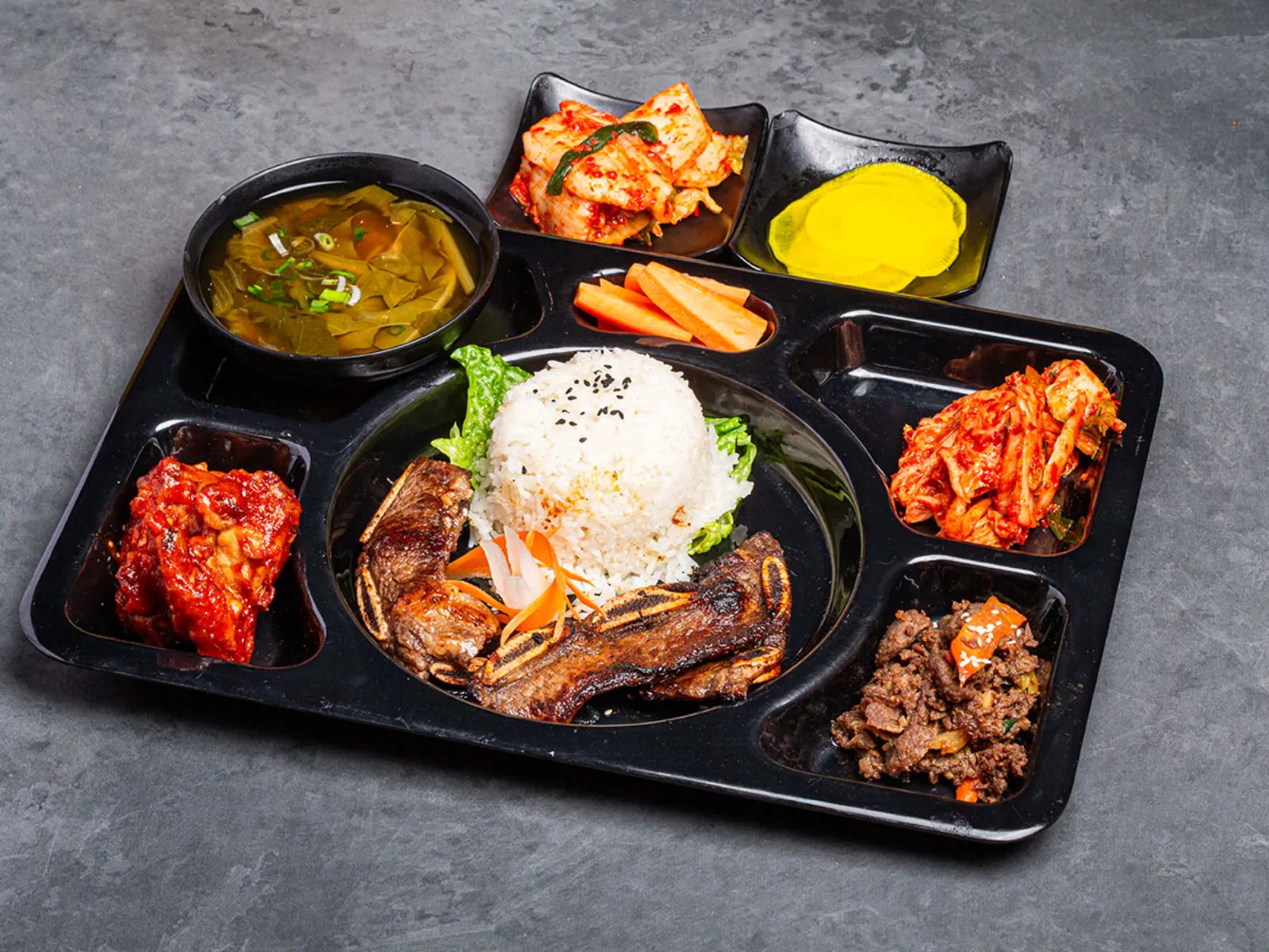Mukbang Shows LA Galbi beef short rib set meal with rice, soup and banchan