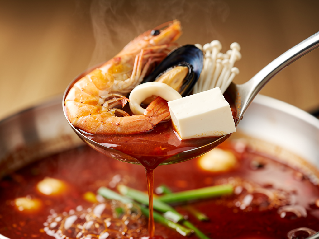 Best Korean Hot Pot in Abu Dhabi (2026): Honest Local Guide 2 Korean jeongol hot pot close-up at a halal Korean restaurant in Abu Dhabi