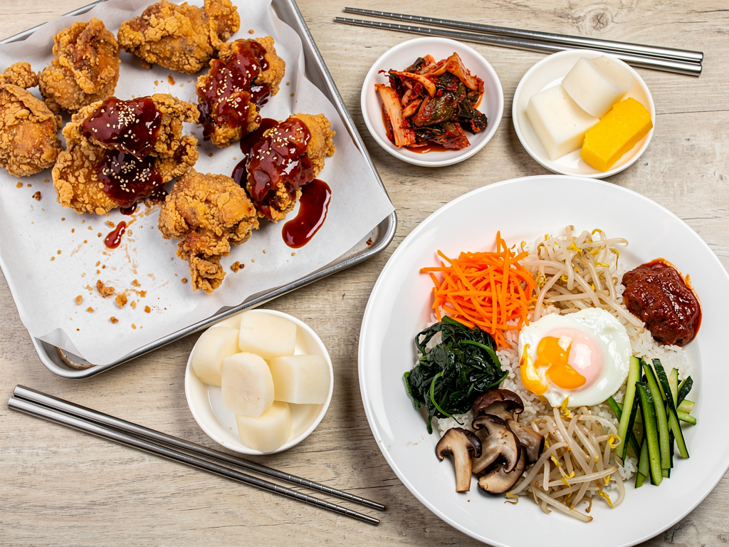 halal Korean fried chicken, vegetable bibimbap and kimchi spread in Fujairah