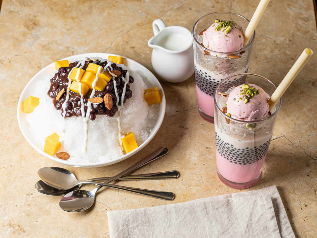 Bingsu Vs Falooda (2026): Honest Local Guide 3 Overhead comparison of a shared bingsu bowl and two tall glasses of falooda